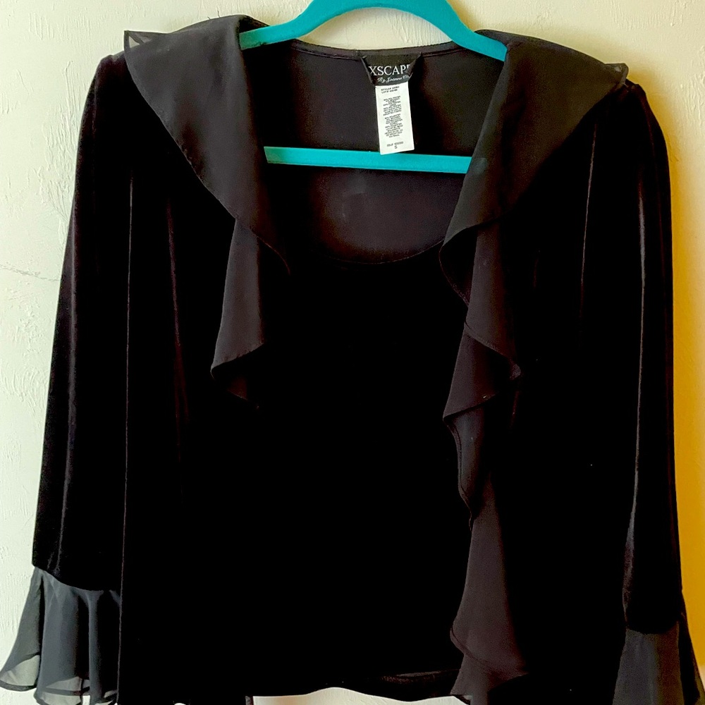 Rich black top w/interior tank topwith sheer accents on sleeves and front